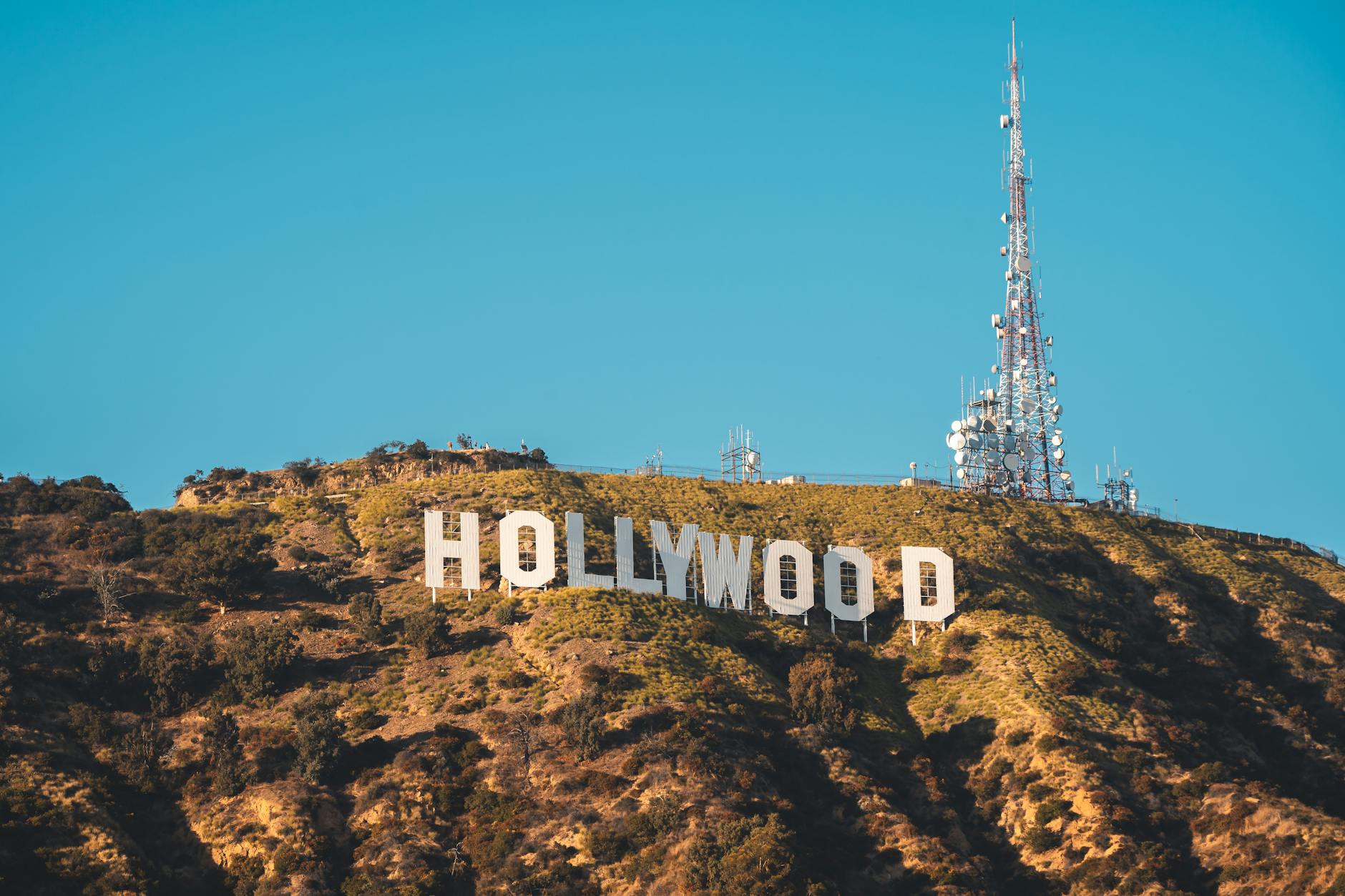 TOP UNDERRATED HOLLYWOOD MOVIES Iconic Hollywood Sign on a sunny day in Los Angeles, California.